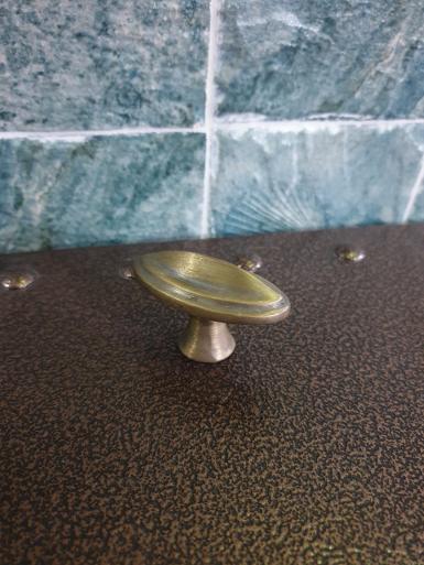 Brass Pull handle Item Code OVAL ELS size long 56 mm wide 27 mm high 38 mm total. base 20 mm. Brass Pull handle Item Code OVAL ELS size long 56 mm wide 27 mm high 38 mm total. base 20 mm.